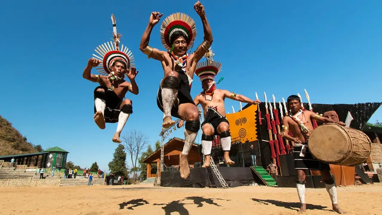 Naga dancers in traditional attire performing at the Hornbill Festival